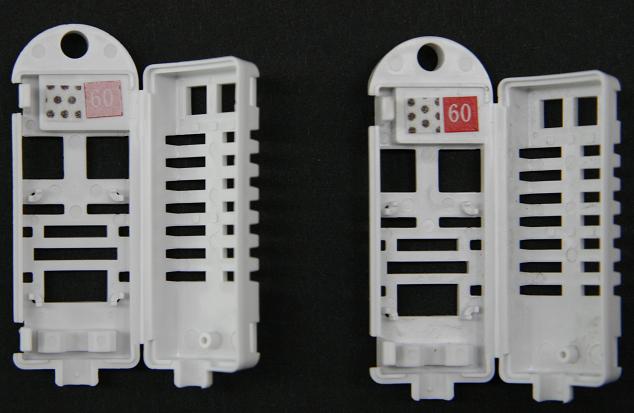 What are the small stickers attached to the temperature-humidity sensor?